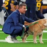 Why Does Herbstreit Travel With a Dog